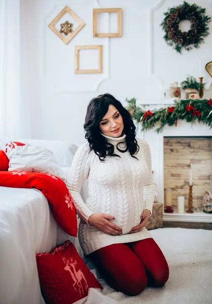 Pregnant Woman at Christmas eve — Stock Photo, Image