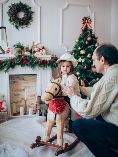 Father and daughter at Christmas eve — Stock Photo, Image