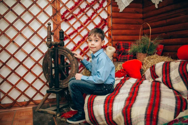 Boy with spinning wheel — Stock Photo, Image
