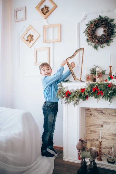 Portrait of boy with harp — Stock Photo, Image