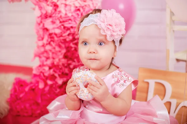 Princess baby girl with donuts — Stock Photo, Image