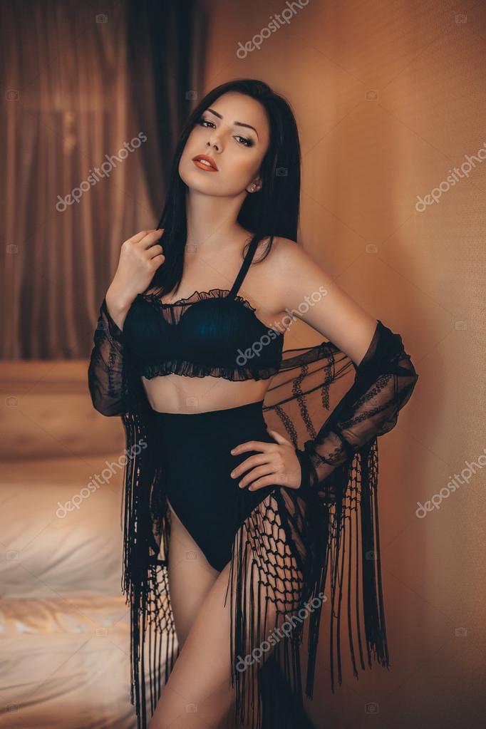Sexy girl in black underclothes Stock Photo by ©Forewer 99665726