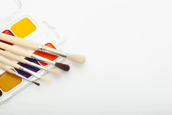 Set Watercolor Paints Paint Brushes White Background Copy Space Text — Stock Photo, Image