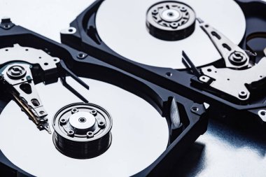 An open computer hard drives for repair. HDD. Components for ps. Storage and restoration of digital data