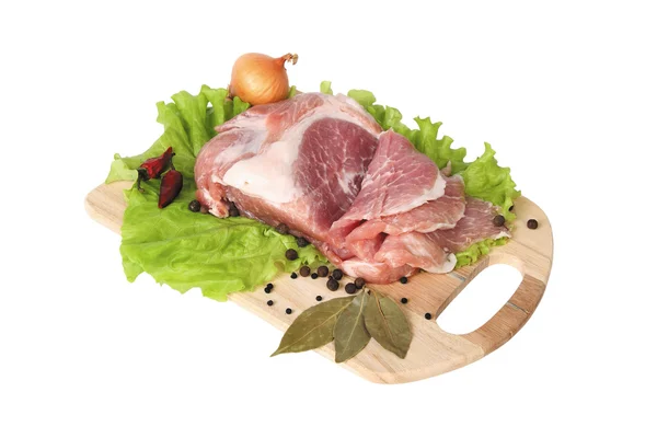 En bit kött på bordet — Stockfoto