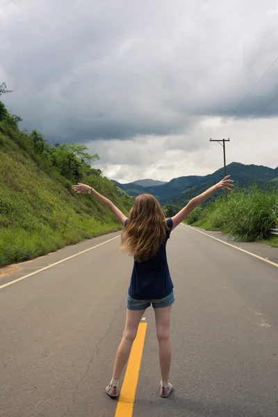 Girl at the empty road at Brazil — Stock Photo, Image