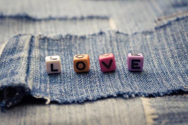 Parola d'amore su un jeans — Foto Stock