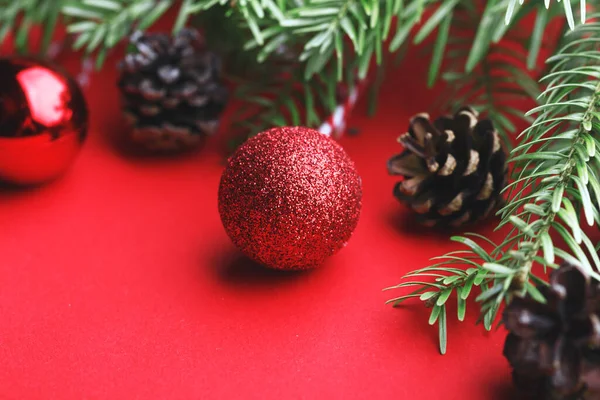 Christmas Background Christmas Tree Twigs Christmas Balls Cones Red Backgroun — Stock Photo, Image