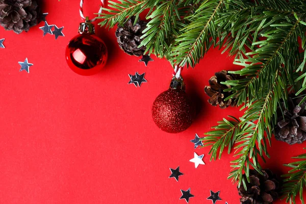 Christmas Background Christmas Tree Twigs Christmas Balls Cones Red Backgroun — Stock Photo, Image