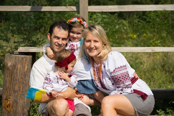 Family in national costumes posing — Stock Photo, Image