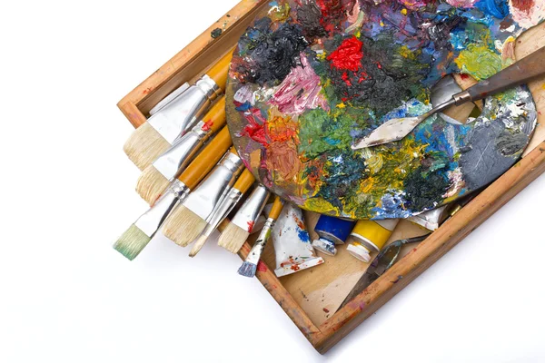 Pallette and  different brushes — Stock Photo, Image
