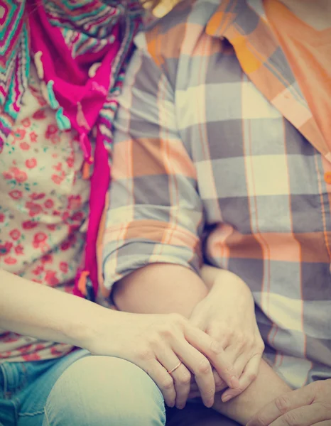 Girl and man holding hands — Stock Photo, Image