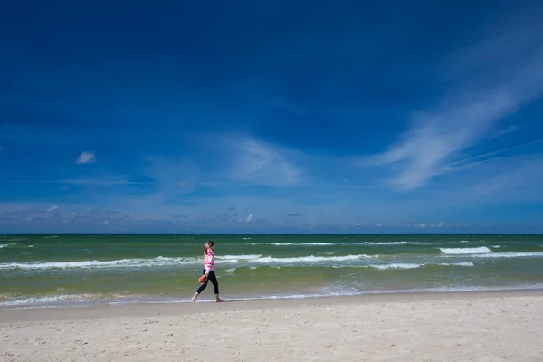 Girl on a beach — Stock Photo, Image