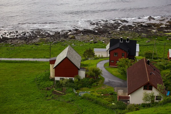 Red houses on a sea coast — Stock Photo, Image