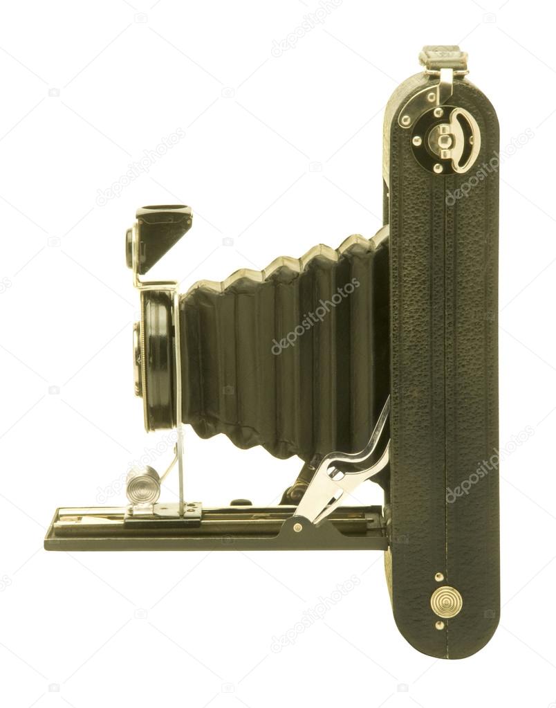 Vintage folding bellows roll film camera in profile — Stock Photo