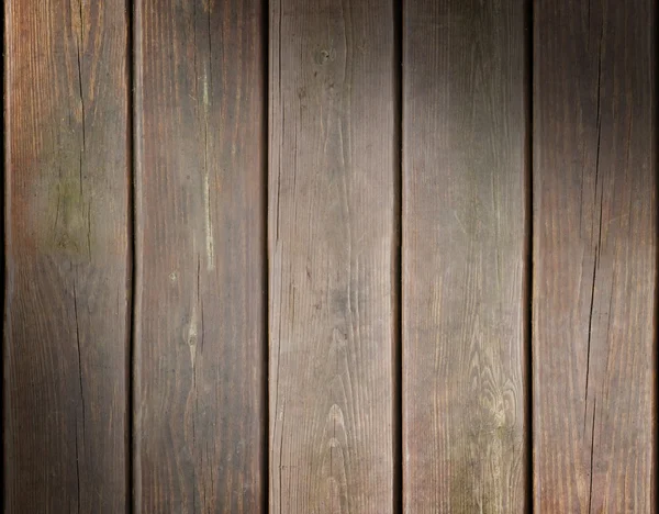 Weathered wooden plank background lit diagonally — Stock Photo, Image