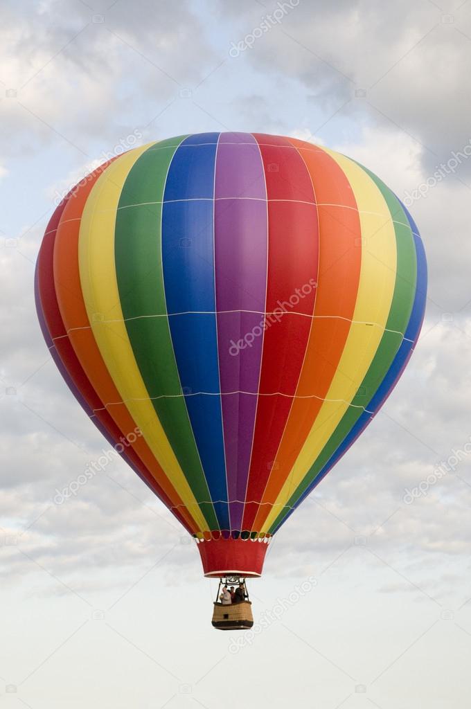 Hot-Air Balloon Floating Among Clouds