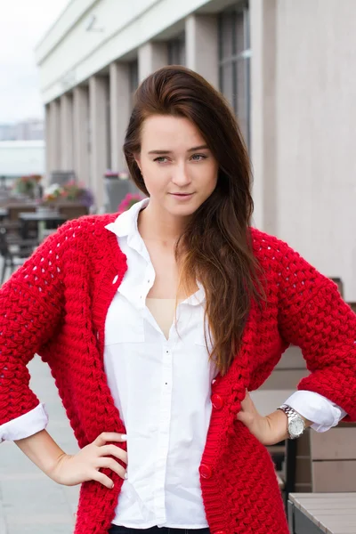 Young business woman in a red cardigan — Stock Photo, Image