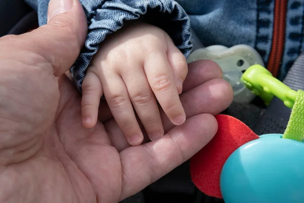 Man Hand Holding Small Child Pen — Stock Photo, Image