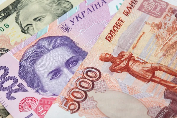 Χρήματα από την Ουκρανία, τη Ρωσία και τις Ηνωμένες Πολιτείες — Φωτογραφία Αρχείου