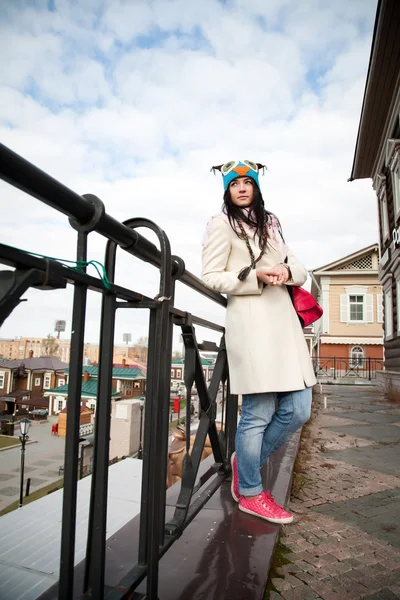 Girl in a hat and a bag — Stock Photo, Image