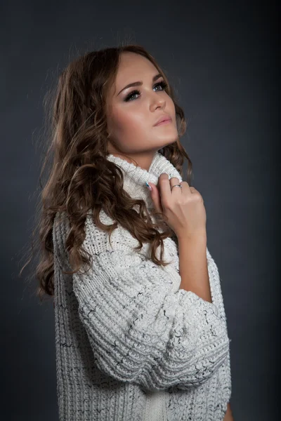 Girl in a sweater. studio portrait — Stock Photo, Image