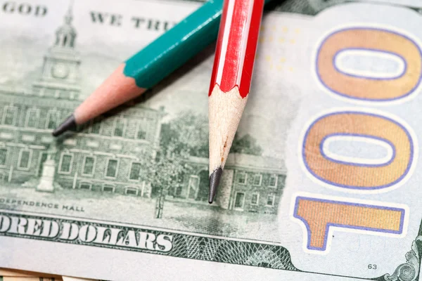 Pencils in US dollars — Stock Photo, Image