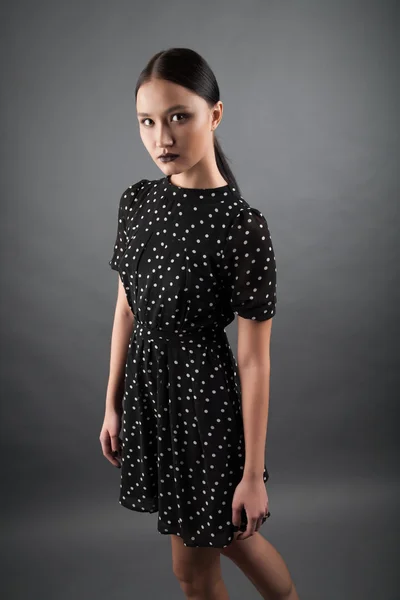 Girl in polka-dot dress — Stock Photo, Image