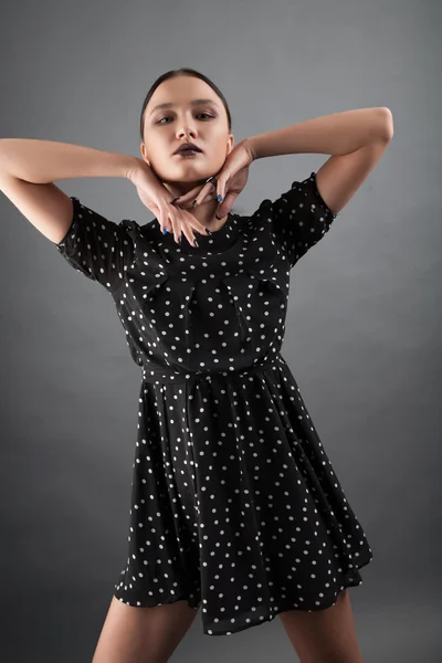 Girl in polka-dot dress — Stock Photo, Image