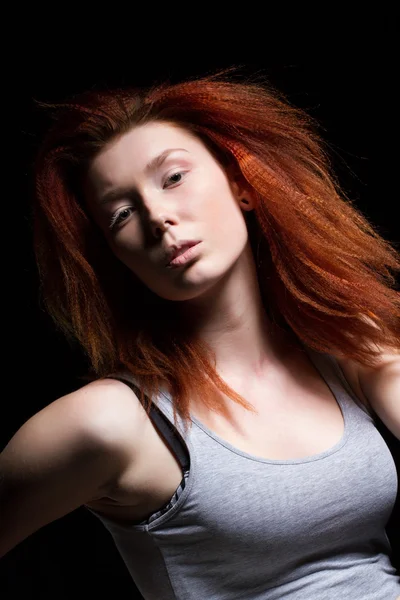 Studio portrait of red-haired young girl — Stock Photo, Image