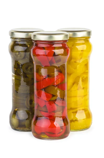 Glass jars with marinated red, yellow, and green pepper slices — Stock Photo, Image