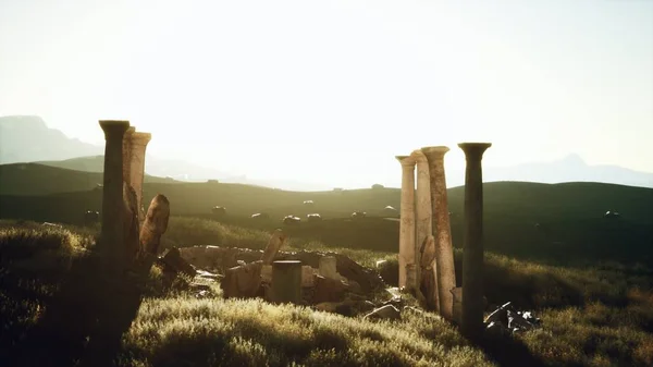 old roman temple ruins at sunset