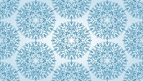 Nahtloses Muster mit blauen Schneeflocken — Stockvektor