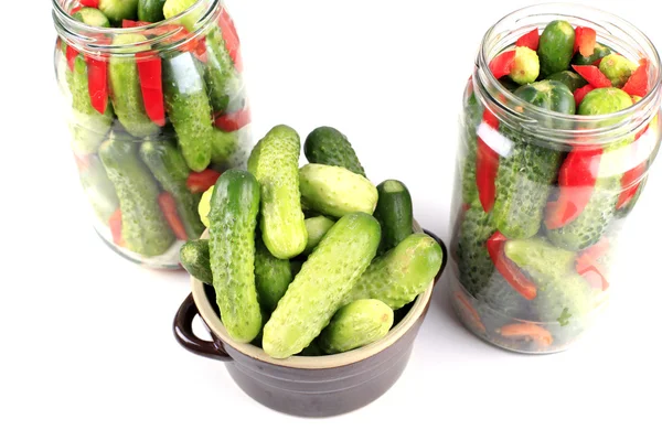 Cucumbers in glass jar — Stock Photo, Image