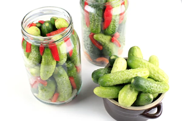 Cucumbers in glass jar — Stock Photo, Image