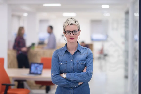 Portrait of young business woman at office — Stock Photo, Image