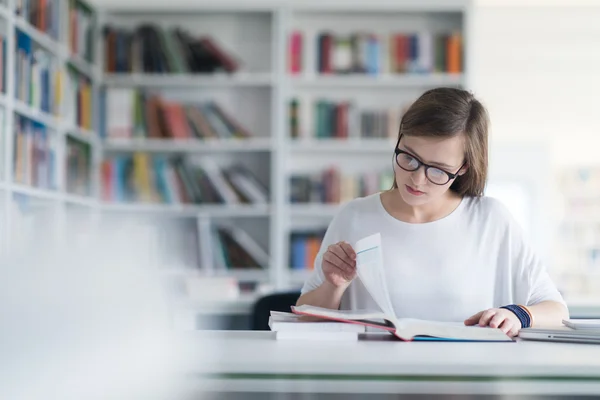Female student study in school library — Stock Photo, Image