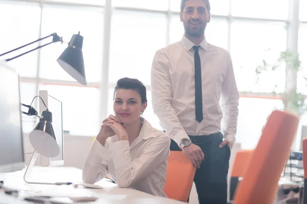 Portrait of business couple at office — Stock Photo, Image