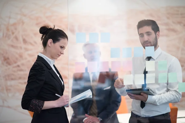 Young creative business people with senior ceo — Stock Photo, Image