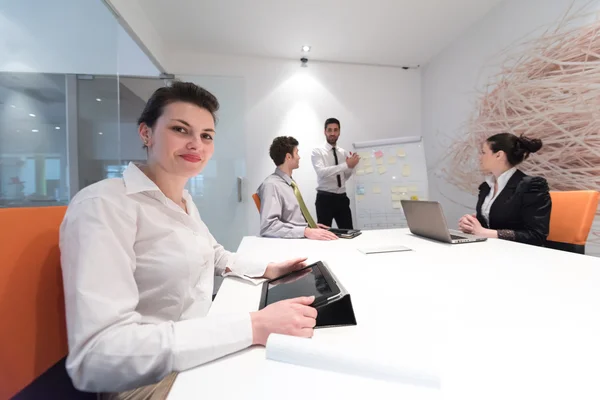 Business people group brainstorming and taking notes to flip boa — Stock Photo, Image