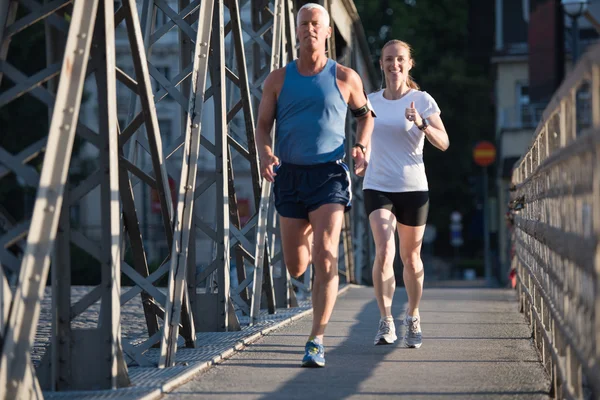 Mladý pár, jogging — Stock fotografie