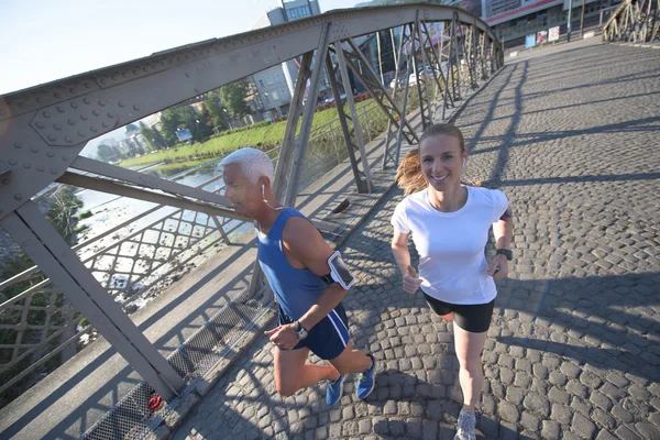 Mladý pár, jogging — Stock fotografie