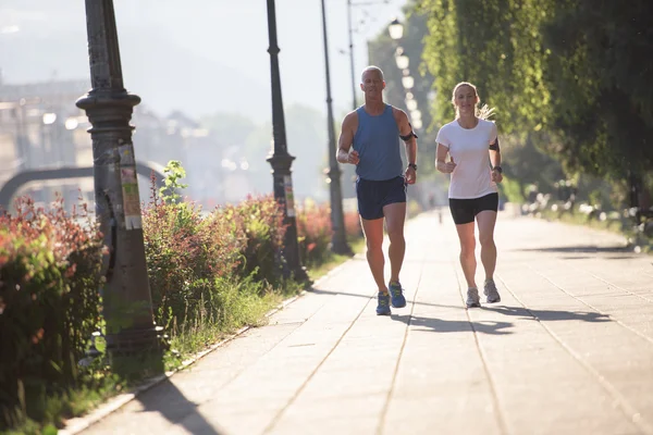 Fiatal pár, jogging — Stock Fotó