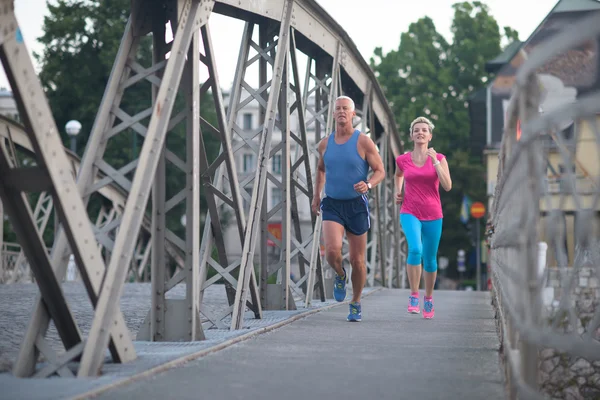 Fiatal pár, jogging — Stock Fotó