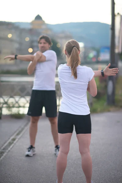 Pár rozcvičení před jogging — Stock fotografie