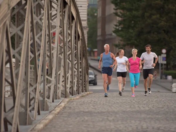 Grupy ludzi jogging — Zdjęcie stockowe