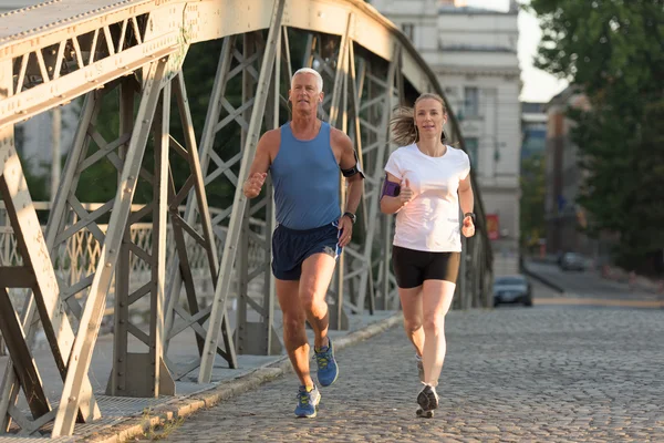 Healty couple jogging — Stock Photo, Image