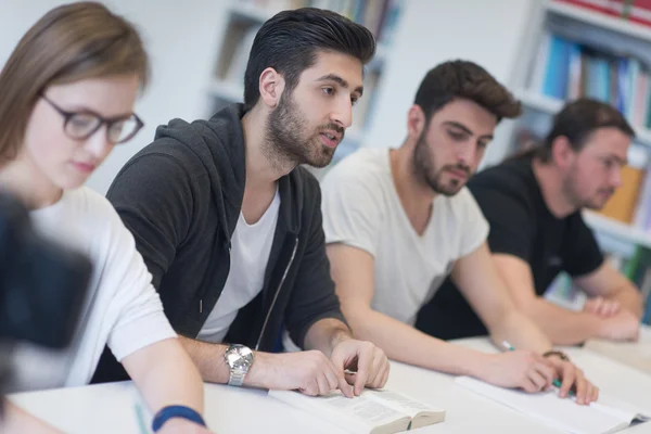Group of students study together in classroom — Stock Photo, Image