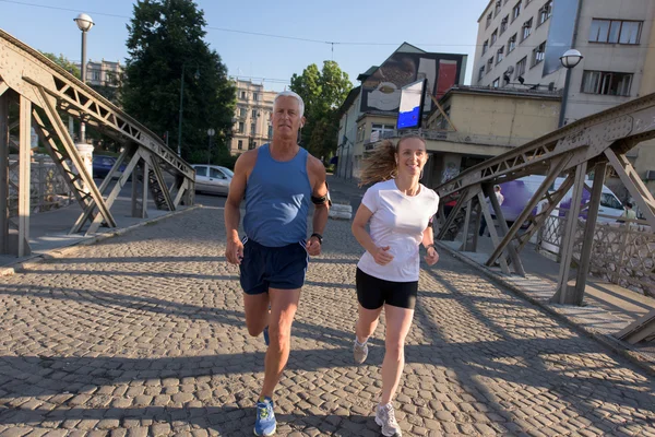 Healty couple jogging — Stock Photo, Image