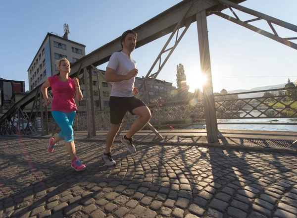 Mature couple jogging — Stock Photo, Image